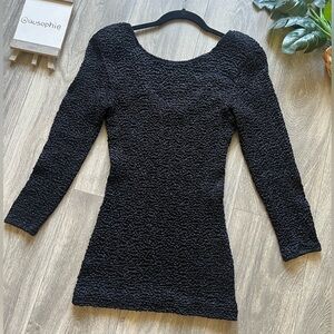Vintage 80’s smocked popcorn bodycon dress in black. Size O/S